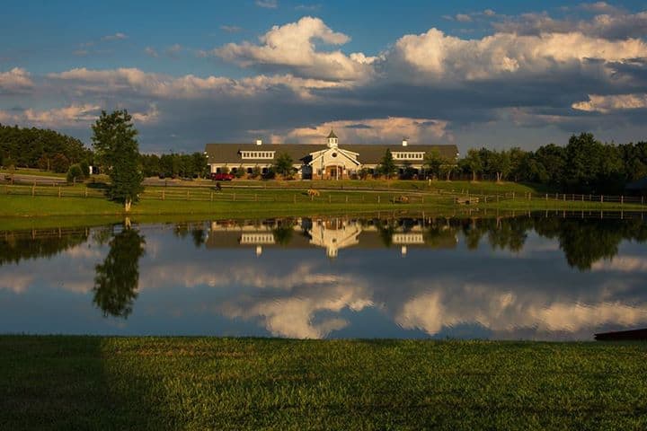 View of Portofino Equestrian Center from across the pond on a cloudy day.