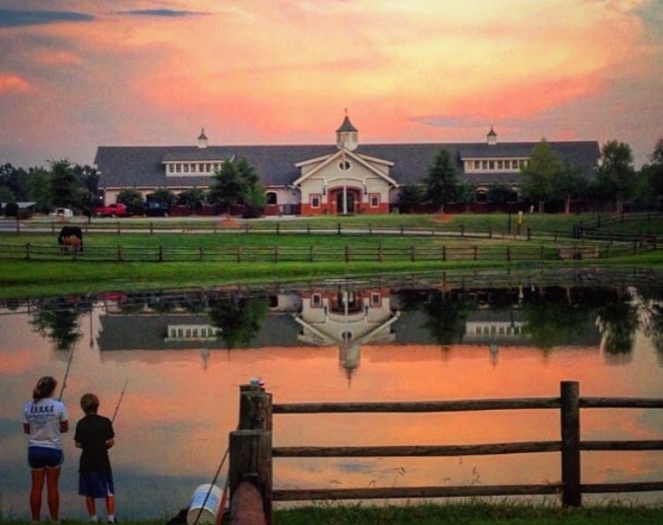 View of Portofino Equestrian Center from across the pond at sunset.